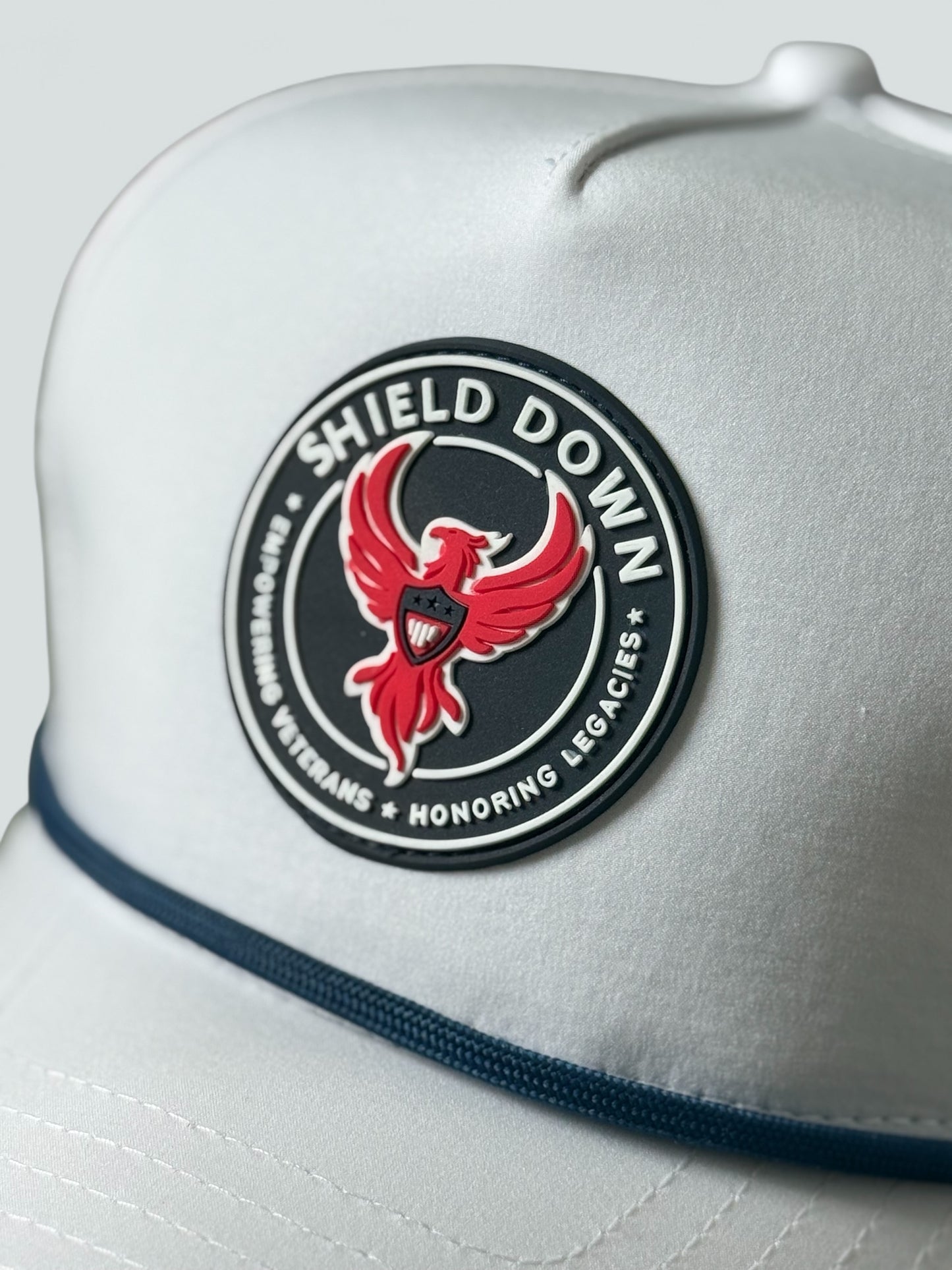 The "Shield Down" Golf Snapback