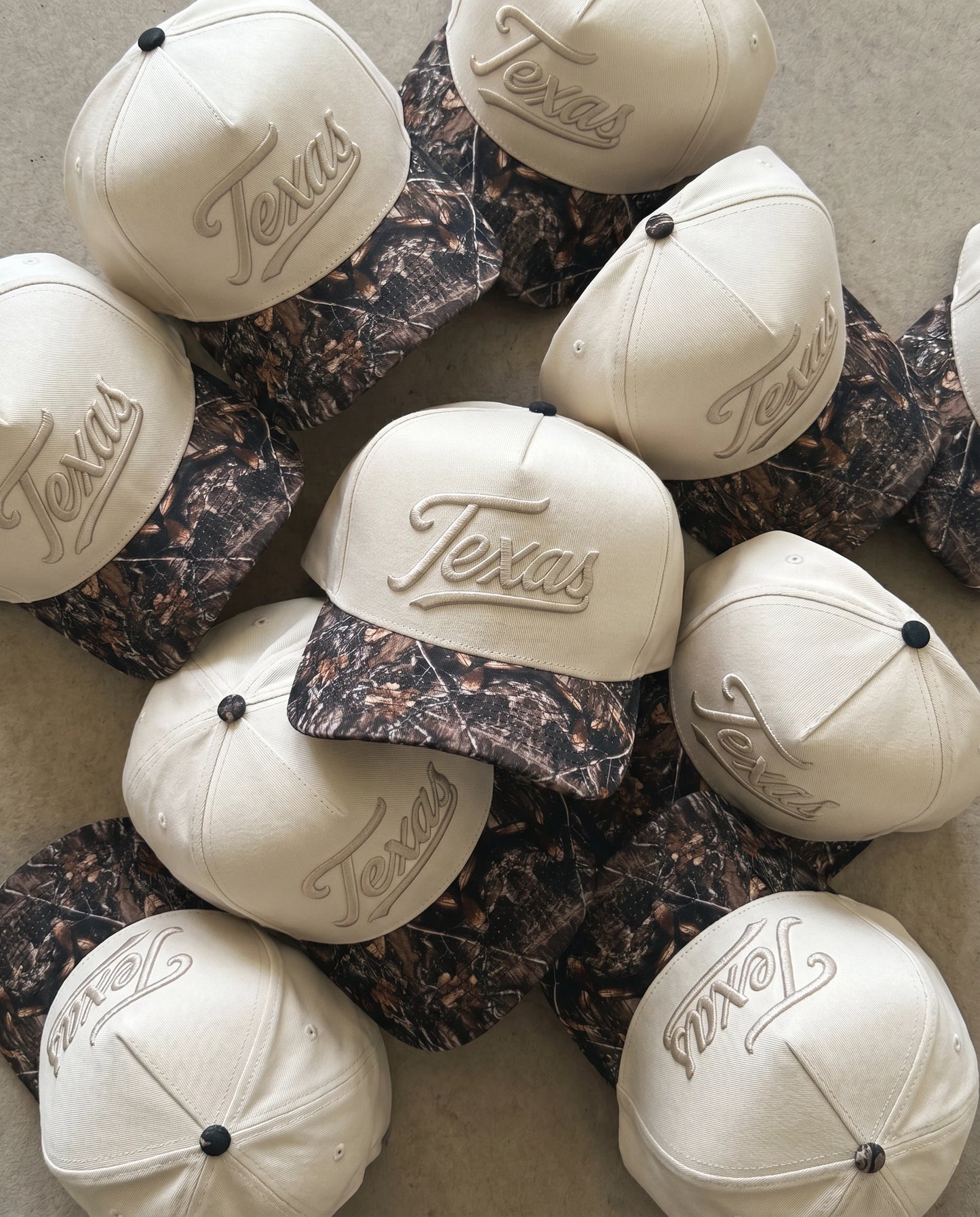 The Texas Script hat - Backwoods Camo